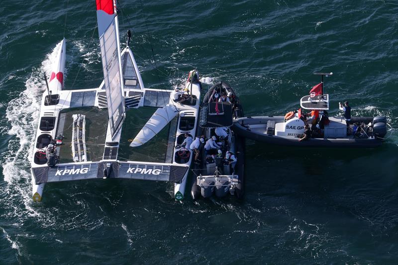 Support Boats work with Japan SailGP Team F50 catamaran after it sustained damage after a collision with Great Britain SailGP Team on Race Day 1 photo copyright David Gray/SailGP taken at Woollahra Sailing Club and featuring the F50 class