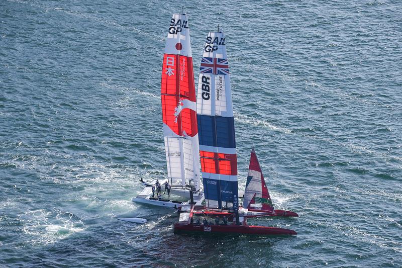 Great Britain SailGP Team pulls up alongside the Japan SailGP Team F50 catamaran after the two collided before the start of Race 3 - photo © David Gray for SailGP