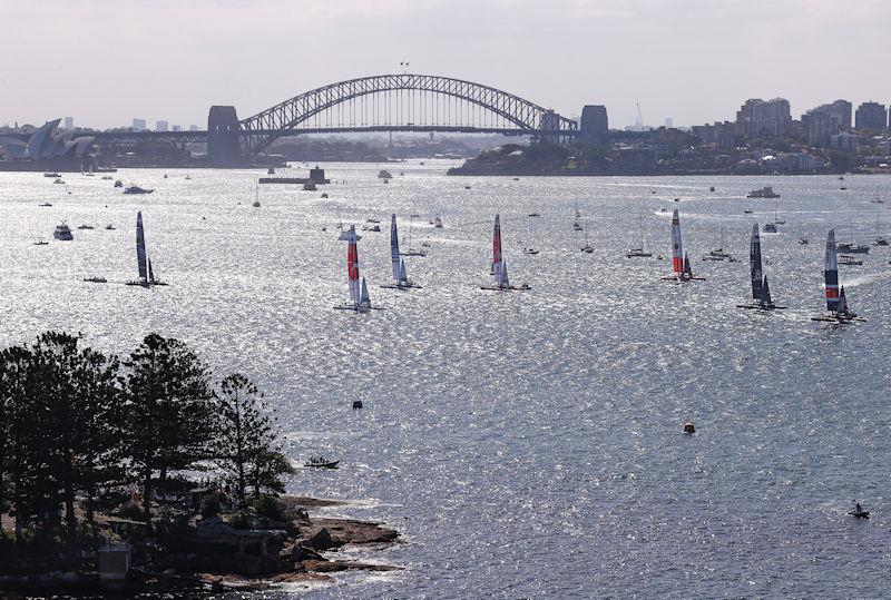 The F50 catamaran fleet sail past Sydney Harbour Bridge on Race Day 1, Australia Sail Grand Prix presented by KPMG photo copyright David Gray for SailGP taken at  and featuring the F50 class