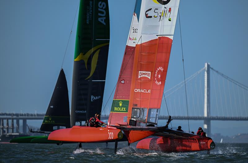 Spain SailGP Team co-helmed by Florian Trittel and Jordi Xammar and Australia SailGP Team helmed by Tom Slingsby sail toward the Oakland Bay Bridge during a practice session ahead of San Francisco SailGP, Season 2 in San Francisco, USA - photo © Ricardo Pinto for SailGP