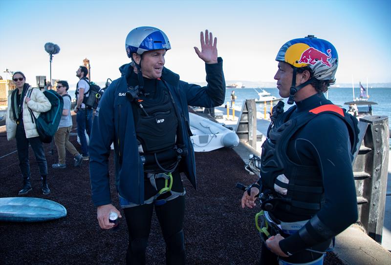 Red Bull surfers Jamie O'Brien and Kai Lenny chat after joining the USA SailGP Team as a sixth sailor for the day for a practice session ahead of San Francisco SailGP, Season 2 in San Francisco, USA. 21st March - photo © Jed Jacobsohn for SailGP