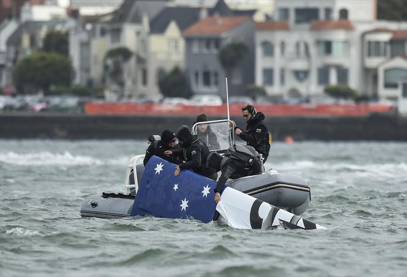 SailGP safety staff retrieve the missing tip of wing of the Australia SailGP Team F50 catamaran following the Australia SailGP Team capsize during a practice session ahead of the San Francisco SailGP, Season 2 in San Francisco, USA. 24th March photo copyright Ricardo Pinto for SailGP taken at San Francisco Yacht Club and featuring the F50 class