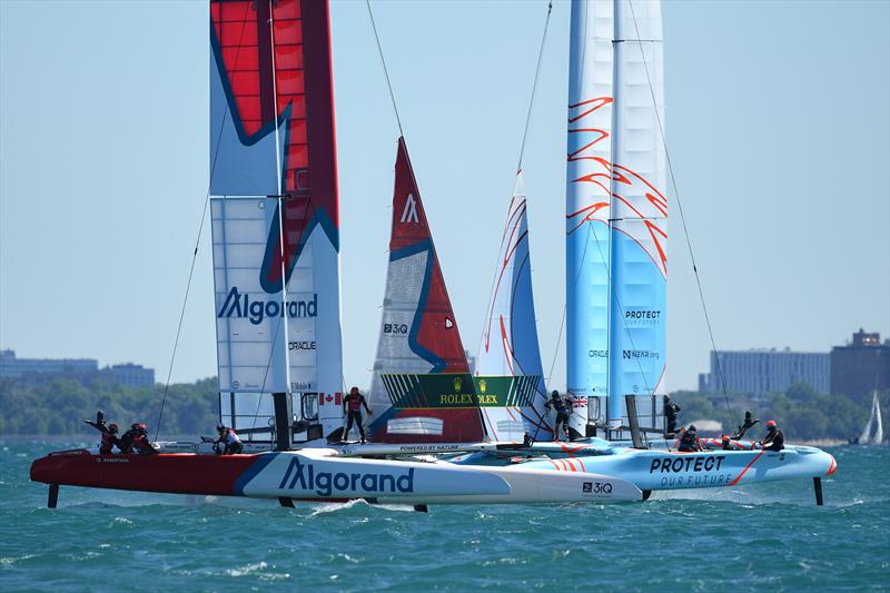 Canada SailGP Team helmed by Phil Robertson and Great Britain SailGP Team helmed by Ben Ainslie in action on Race Day 1 of the T-Mobile United States Sail Grand Prix | Chicago at Navy Pier, Lake Michigan, Season 3 - June 2022 photo copyright Ricardo Pinto/SailGP taken at Chicago Yacht Club and featuring the F50 class