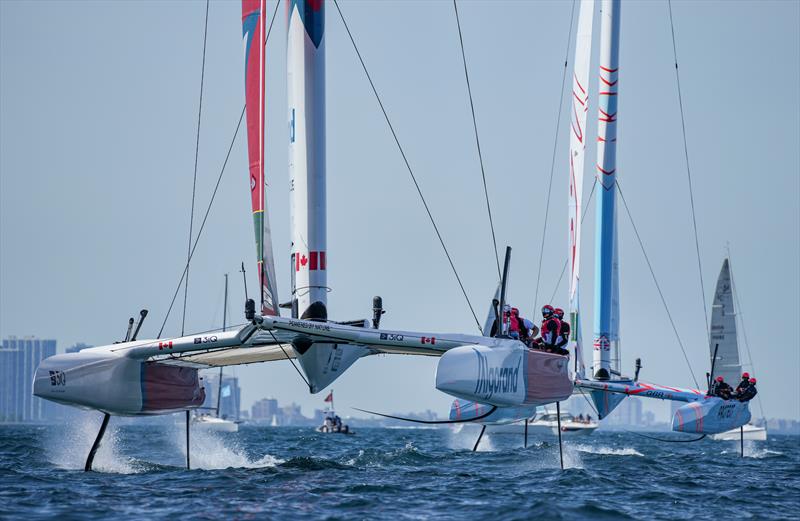 Canada SailGP Team sail past Great Britain SailGP Team on Race Day 2  - T-Mobile United States Sail Grand Prix, Chicago at Navy Pier, Lake Michigan, Season 3 photo copyright Bob Martin/SailGP taken at Chicago Sailing and featuring the F50 class