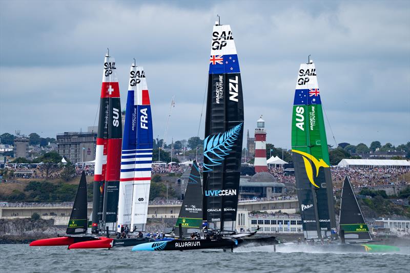 Switzerland SailGP Team, Australia SailGP Team , France SailGP Team and New Zealand SailGP Team in action on Race Day 1 of the Great Britain Sail Grand Prix | Plymouth in Plymouth, England. 30th July 2022 photo copyright Bob Martin/ SailGP taken at Royal Plymouth Corinthian Yacht Club and featuring the F50 class