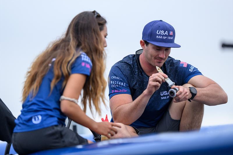 Alex Sinclair, grinder of USA SailGP Team, and CJ Perez of USA SailGP Team tend to the equipment on the USA SailGP Team F50 catamaran at Great Britain Sail Grand Prix | Plymouth photo copyright Jon Buckle for SailGP taken at  and featuring the F50 class