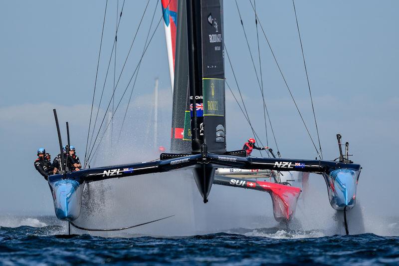 The New Zealand SailGP Team helmed by Peter Burling and Switzerland SailGP Team helmed by Nathan Outteridge in action on Race Day 2 of the ROCKWOOL Denmark Sail Grand Prix in Copenhagen, Denmark photo copyright Ricardo Pinto for SailGP taken at  and featuring the F50 class