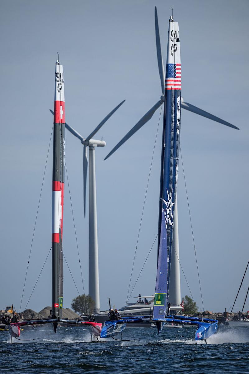 Switzerland SailGP Team helmed by Nathan Outteridge and USA SailGP Team helmed by Jimmy Spithill in action on Race Day 2 of the ROCKWOOL Denmark Sail Grand Prix in Copenhagen, Denmark photo copyright Ricardo Pinto for SailGP taken at  and featuring the F50 class