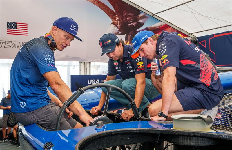 Jimmy Spithill, CEO & driver of USA SailGP Team, shows the cockpit and wheel of the USA SailGP Team F50 catamaran to Max Verstappen and Sergio Perez, Red Bull Racing Formula One drivers - Range Rover France Sail Grand Prix in Saint Tropez, France\ photo copyright Adam Warner/SailGP taken at Société Nautique de Saint-Tropez and featuring the F50 class