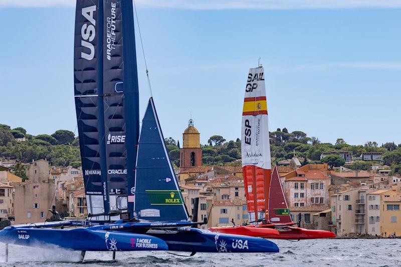 USA SailGP Team helmed by Jimmy Spithill and Spain SailGP Team helmed by Jordi Xammar sail past the Bell Tower of Saint Tropez on Race Day 1 of the Range Rover France Sail Grand Prix in Saint Tropez, France - photo © David Gray for SailGP