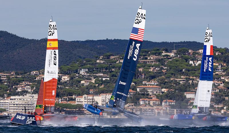 The F50 catamaran of USA SailGP Team helmed by Jimmy Spithill goes airborne between Spain SailGP Team and France SailGP Team on Race Day 1 of the Range Rover France Sail Grand Prix in Saint Tropez, France photo copyright David Gray for SailGP taken at  and featuring the F50 class