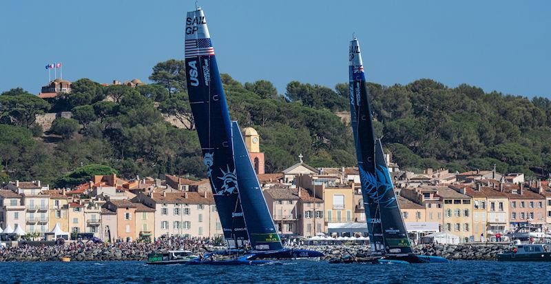 USA SailGP Team helmed by Jimmy Spithill and New Zealand SailGP Team helmed by Peter Burling sail past the Old Town and Bell Tower of Saint Tropez on Race Day 2 of the Range Rover France Sail Grand Prix in Saint Tropez, France photo copyright Bob Martin for SailGP taken at  and featuring the F50 class