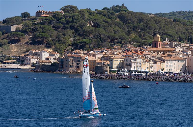 Great Britain SailGP Team helmed by Ben Ainslie sail past the Old Town and Bell Tower of Saint Tropez on Race Day 2 of the Range Rover France Sail Grand Prix in Saint Tropez, France photo copyright David Gray for SailGP taken at  and featuring the F50 class