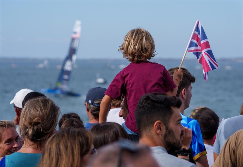 Spectators watch the racing from the shore on Race Day 2 of the Spain Sail Grand Prix in Cadiz, Andalusia, Spain photo copyright Ben Queenborough for SailGP taken at  and featuring the F50 class