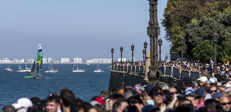Australia SailGP Team helmed by Tom Slingsby sail past the spectators along the seawall on Race Day 1 of the Spain Sail Grand Prix in Cadiz, Andalusia, Spain. 24th September - photo © Ian Roman for SailGP