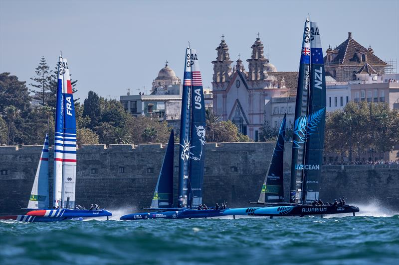 France SailGP Team, USA SailGP Team, and New Zealand SailGP Team  sail past the Cadiz Cathedral on Race Day 1 of the Spain Sail Grand Prix in Cadiz, Andalusia, Spain. 24 Sept 2022 photo copyright Felix Diemer/SailGP taken at Real Club Náutico de Cádiz and featuring the F50 class