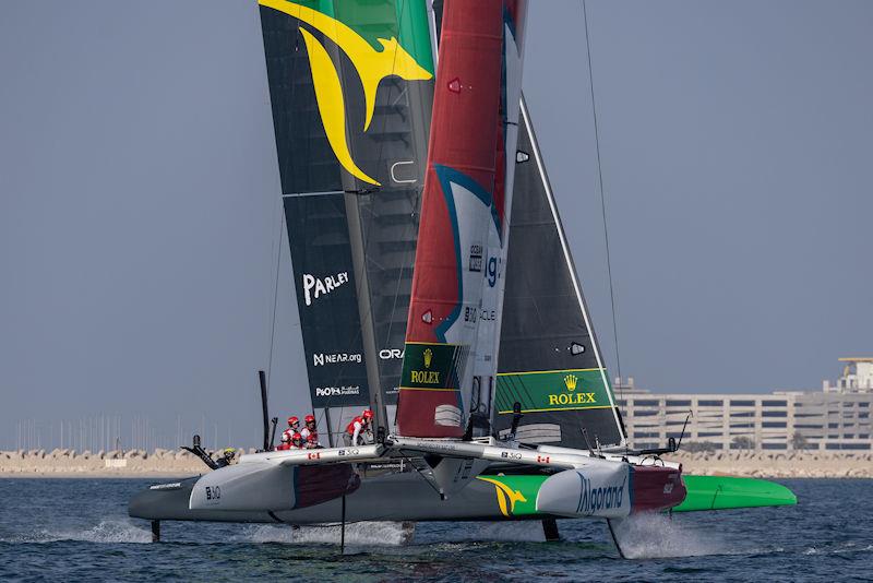 Canada SailGP Team helmed by Phil Robertson cross paths with Australia SailGP Team helmed by Tom Slingsby during a practice session ahead of the Dubai Sail Grand Prix presented by P&O Marinas in Dubai, United Arab Emirates - photo © Felix Diemer for SailGP