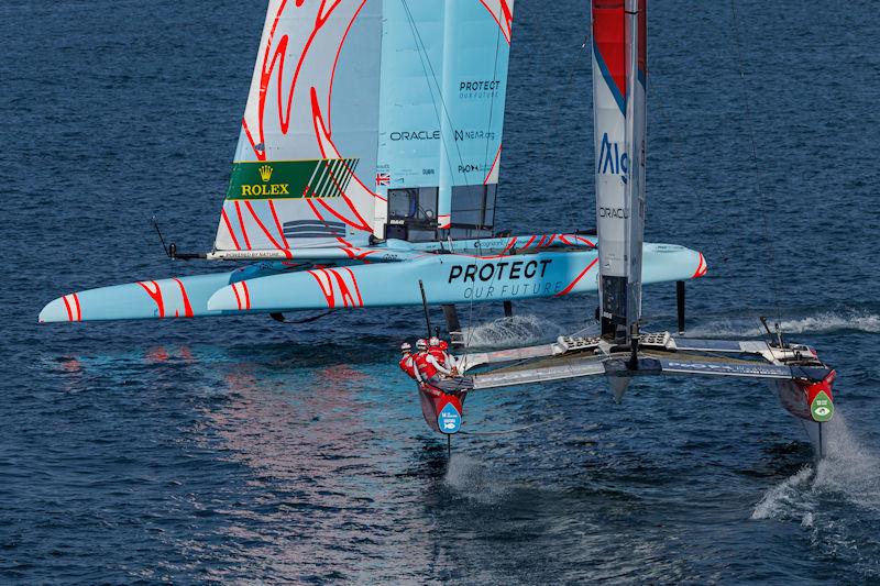 Canada SailGP Team helmed by Phil Robertson and Great Britain SailGP Team helmed by Ben Ainslie in action on Race Day 1 of the Dubai Sail Grand Prix presented by P&O Marinas in Dubai, United Arab Emirates - photo © David Gray for SailGP