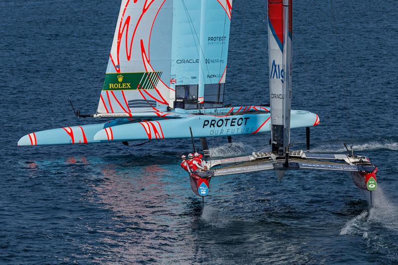 Canada SailGP Team helmed by Phil Robertson and Great Britain SailGP Team helmed by Ben Ainslie in action on Race Day 1 of the Dubai Sail Grand Prix presented by P&O Marinas in Dubai, United Arab Emirates photo copyright David Gray for SailGP taken at  and featuring the F50 class