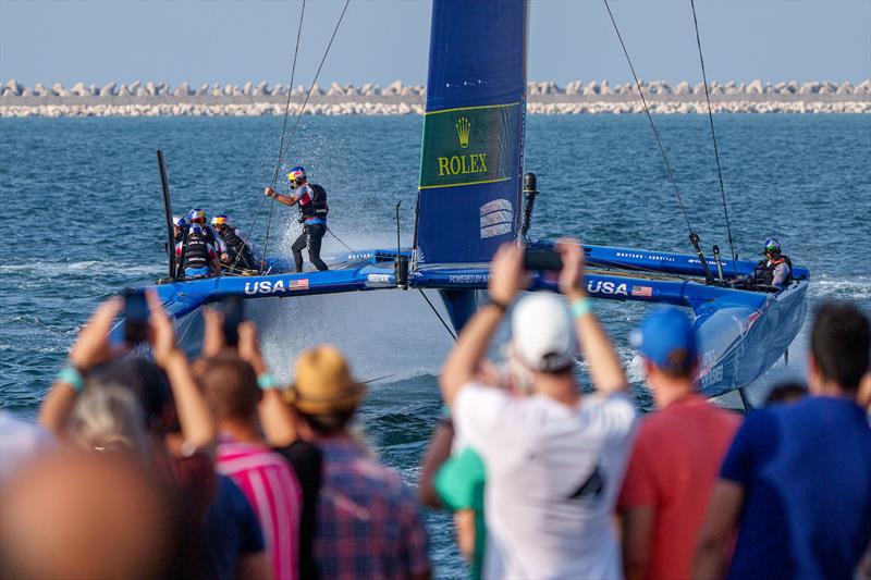 Spectators watch on as USA SailGP Team helmed by Jimmy Spithill sail closely past the Race Village on Race Day 2 of the Dubai Sail Grand Prix presented by P&O Marinas in Dubai, United Arab Emirates - photo © Joe Toth for SailGP