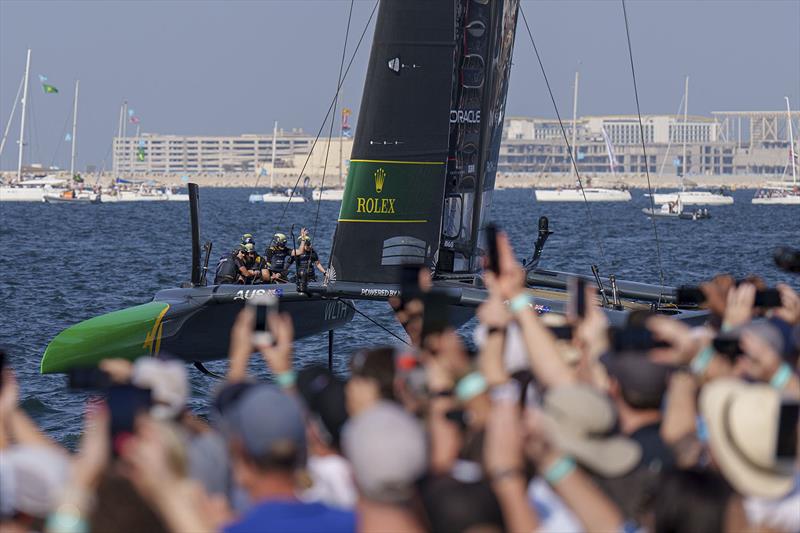 Spectators watch on as Australia SailGP Team helmed by Tom Slingsby sail closely past the Race Village on Race Day 2 of the Dubai Sail Grand Prix presented by P&O Marinas in Dubai, United Arab Emirates. 13th November photo copyright Joe Toth for SailGP taken at Dubai Offshore Sailing Club and featuring the F50 class