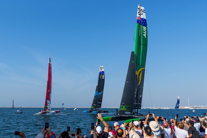 Canada SailGP Team, New Zealand SailGP Team  Australia SailGP Team sail closely past the Race Village on Race Day 1 of the Dubai Sail Grand Prix, November 2022 photo copyright Joe Toth/SailGP taken at Dubai Offshore Sailing Club and featuring the F50 class