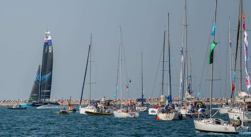 Spectators on the Bring Your Own Boat program watch on as New Zealand SailGP Team sails past on Race Day 1 of the Dubai Sail Grand Prix presented by P&O Marinas in Dubai - November 2022 photo copyright Ricardo Pinto/SailGP taken at Dubai Offshore Sailing Club and featuring the F50 class