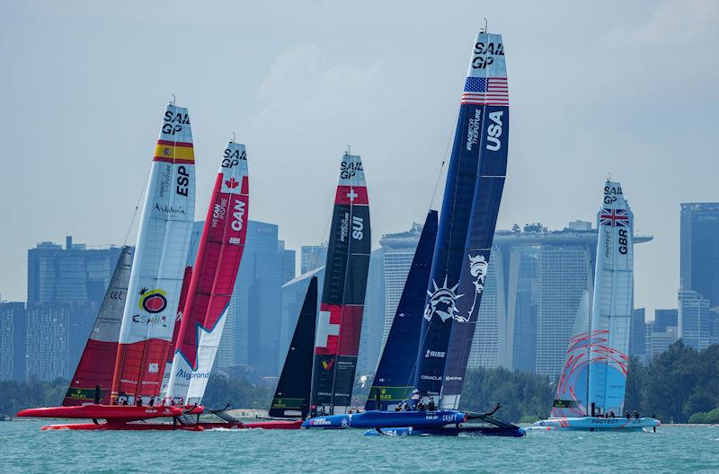 Spain SailGP Team, Canada SailGP Team, Switzerland SailGP Team, USA SailGP Team and Great Britain SailGP Team take part in a practice session against the backdrop of the city skyline ahead of the Singapore Sail Grand Prix photo copyright Bob Martin for SailGP taken at  and featuring the F50 class