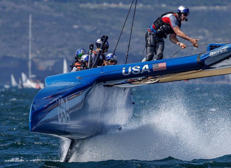 Cooper Dressler, grinder of USA SailGP Team, crosses the boat during a manoeuvre on Race Day 1 of the KPMG Australia Sail Grand Prix in Sydney photo copyright David Gray for SailGP taken at Royal Sydney Yacht Squadron and featuring the F50 class