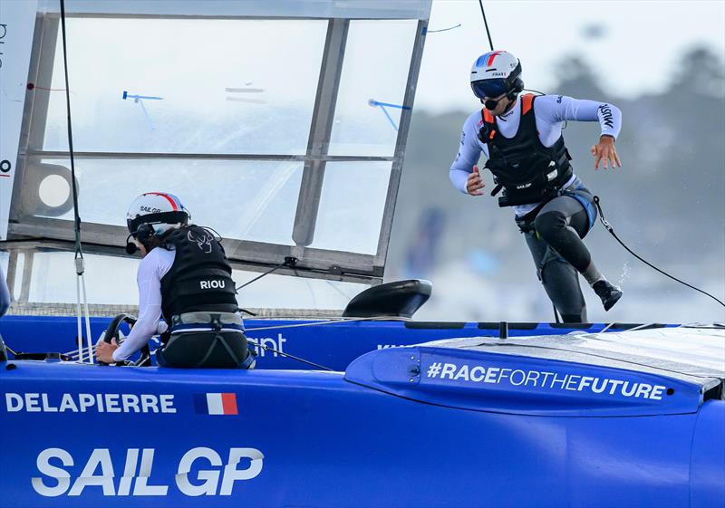 Quentin Delapierre, driver of France SailGP Team, runs across as Amelie Riou, strategist of France SailGP Team, steers the boat on Race Day 1 of the KPMG Australia Sail Grand Prix - photo © Ricardo Pinto for SailGP