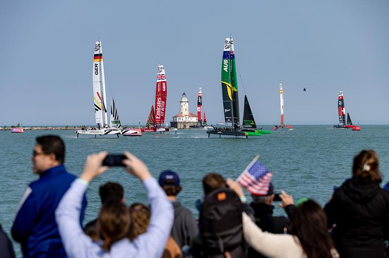 Australia SailGP Team helmed by Tom Slingsby leads the fleet past the spectators in the SailGP Race Stadium on Race Day 1 of the Rolex United States Sail Grand Prix | Chicago at Navy Pier, Season 4, in Chicago, Illinois, USA. 16th June - photo © Katelyn Mulcahy for SailGP
