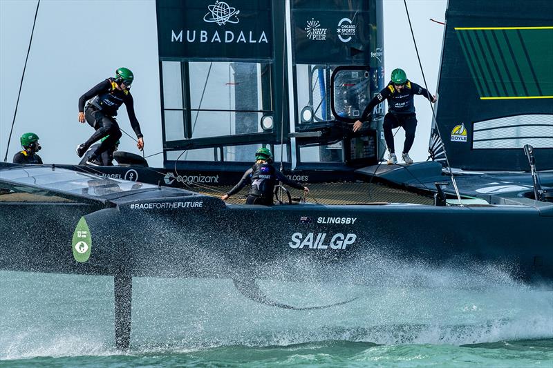 Tash Bryant,takes control of the wheel as Kinley Fowler, and Kyle Langford, run across the boat on Race Day 1 of the Rolex United States Sail Grand Prix | Chicago at Navy Pier, Season 4, in Chicago, Illinois, USA. 16th June - photo © Ricardo Pinto for SailGP