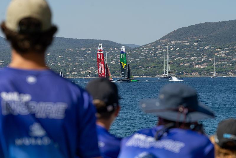 Young sailors take part in the Inspire Racing x WASZP program look on as Emirates Great Britain SailGP Team helmed by Ben Ainslie and Australia SailGP Team helmed by Tom Slingsby compete on Race Day 2 of the France Sail Grand Prix in Saint-Tropez, France - photo © Andrew Baker for SailGP