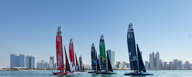 The SailGP F50 catamaran fleet sails past the Abu Dhabi skyline ahead of the Mubadala Abu Dhabi Sail Grand Prix presented by Abu Dhabi Sports Council photo copyright Felix Diemer for SailGP taken at  and featuring the F50 class