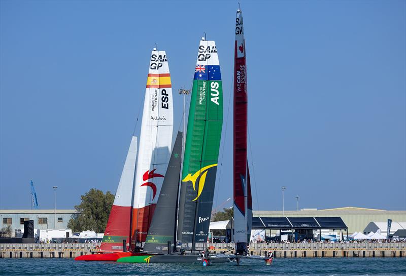 Canada SailGP Team helmed by Phil Robertson with Australia SailGP Team helmed by Tom Slingsby and Spain SailGP Team helmed by Diego Botin on Race Day 1,United Arab Emirates. 13th January - photo © Felix Diemer