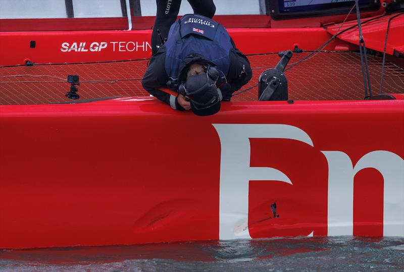 Emirates Great Britain SailGP Team helmed by Giles Scott check their F50 catamaran for any damage following contact with the Spain SailGP Team ahead of the ITM New Zealand Sail Grand Prix in Christchurch, New Zealand photo copyright Felix Diemer for SailGP taken at  and featuring the F50 class