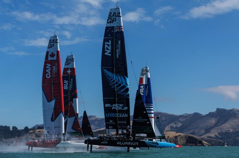 NZ SailGP Team helmed by Peter Burling lead alongside France SailGP Team helmed by Quentin Delapierre in front of Canada SailGP Team and Switzerland SailGP Team during racing on Race Day 2 of the ITM New Zealand Sail Grand Prix in Christchurch, NZ photo copyright Chloe Knott for SailGP taken at  and featuring the F50 class