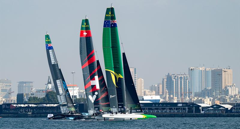 Australia SailGP Team helmed by Tom Slingsby, Switzerland SailGP Team helmed by Sebastien Schneiter and New Zealand SailGP Team helmed by Peter Burling in action on Race Day 1 of the Emirates Dubai Sail Grand Prix presented by P&O Marinas in Dubai, UAE - photo © Ricardo Pinto for SailGP