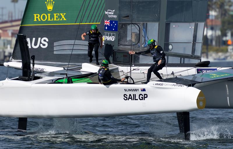 Australia SailGP Team helmed by Tom Slingsbyon as Tash Bryant, strategist of Australia SailGP Team, crosses the boat Race Day 2 of the Rolex Los Angeles Sail Grand Prix - photo © Felix Diemer for SailGP