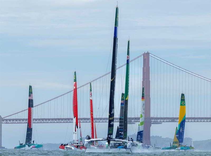 Australia SailGP Team helmed by Tom Slingsby trail France SailGP Team helmed by Quentin Delapierre as the SailGP Fleet passes the the Golden Gate Bridge on Race Day 1 of the Oracle San Francisco Sail Grand Prix - photo © Felix Diemer for SailGP