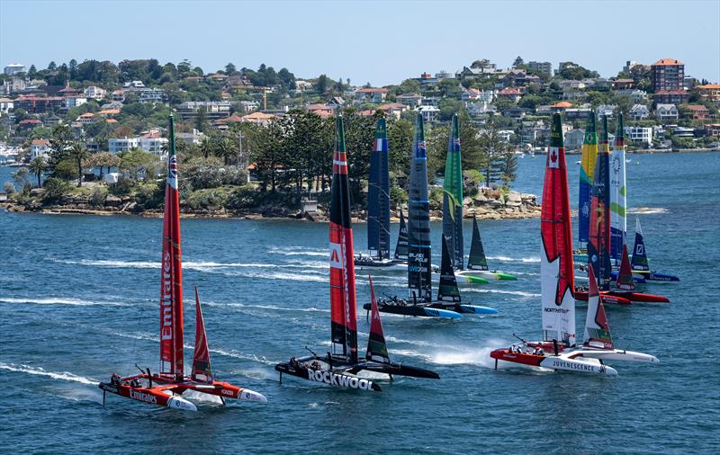 The fleet sails past Shark Island led by Canada NorthStar SailGP Team helmed by Giles Scott with ROCKWOOL Denmark SailGP Team and Emirates Great Britain SailGP Team sail past Shark Island during practice racing ahead of the KPMG Australia Sail Grand Prix photo copyright Jon Buckle for SailGP taken at  and featuring the F50 class