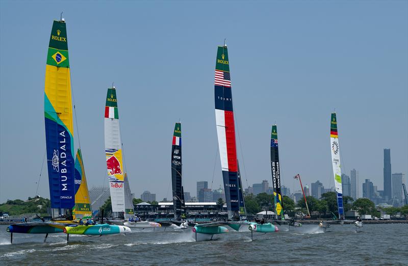 Teams sail past New York skyline - Mubadala New York Sail Grand Prix - June 6, 2025 - photo © Ricardo Pinto/SailGP