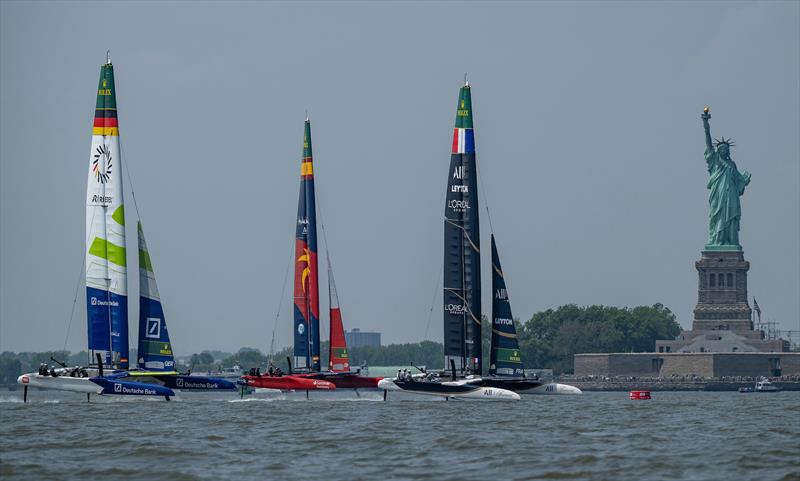 Teams sail past Statue of Liberty - Mubadala New York Sail Grand Prix - June 6, 2025 - photo © Ricardo Pinto/SailGP