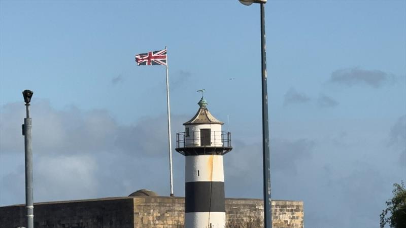 The Ensign is very straight - Portsmouth waterfront on Tuesday evening, ahead of this weekend's SailGP Portsmouth photo copyright Richard Gladwell - Sail-World.com / nz taken at Wakatere Boating Club and featuring the F50 class