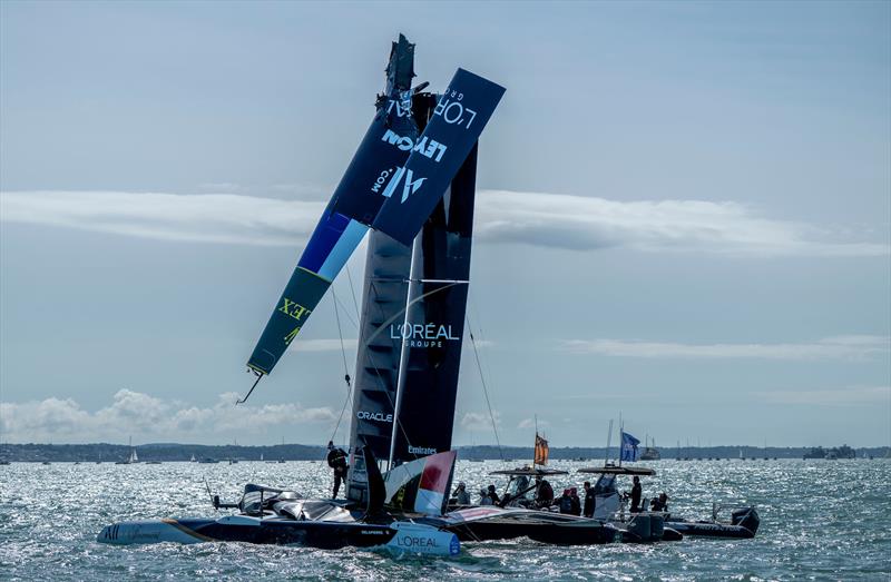 The France SailGP Team helmed by Quentin Delapierre with its damaged wing on Race Day 1 of the Emirates Great Britain Sail Grand Prix in Portsmouth, UK - photo © Ricardo Pinto for SailGP
