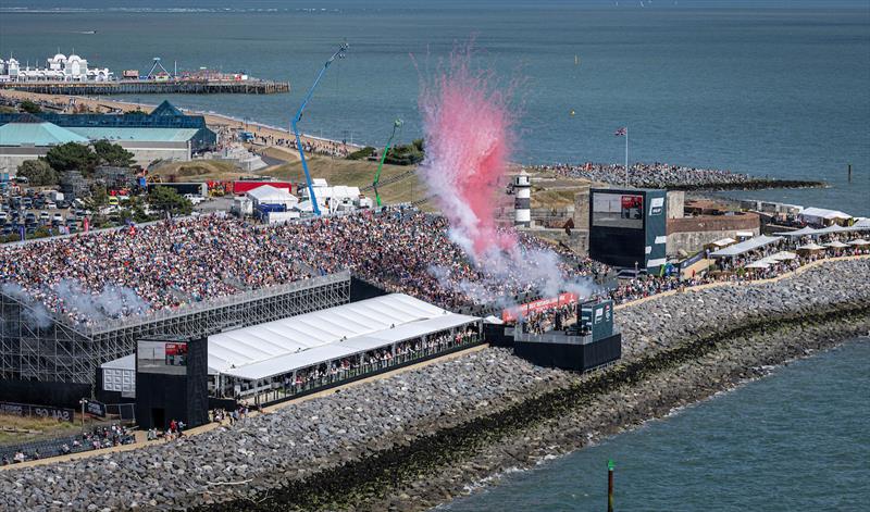 Pyrotechnics are fired on the stage opposite the SailGP Grandstand ahead of racing on Race Day 2 of the Emirates Great Britain Sail Grand Prix in Portsmouth, UK - photo © Simon Bruty for SailGP