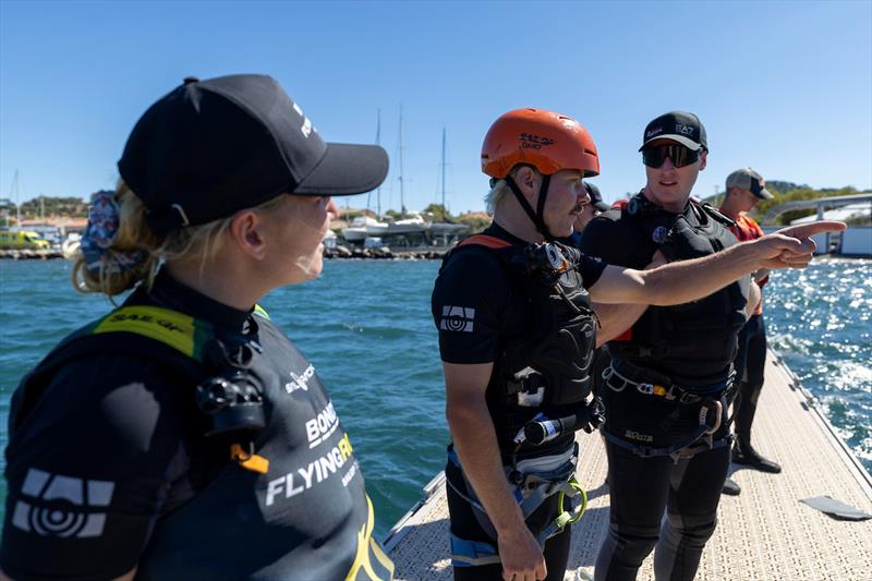 Valteri Bottas, Finish Formula 1 driver and Tiffany Cromwell, Australian Cyclist undergo their safety training in the technical area ahead of the ROCKWOOL France Sail Grand Prix held in Saint Tropez, France  photo copyright Felix Diemer for SailGP taken at  and featuring the F50 class