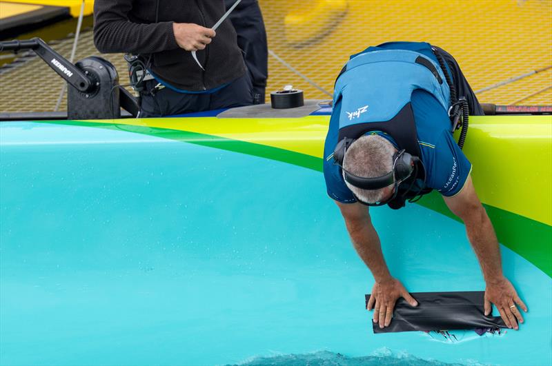 The Tech Team put a temporary patch on Mubadala Brazil SailGP Team - Race Day 2 of the Rolex Switzerland Sail Grand Prix - Geneva, Switzerland - September 21, 2025 - photo © Felix Diemer for SailGP