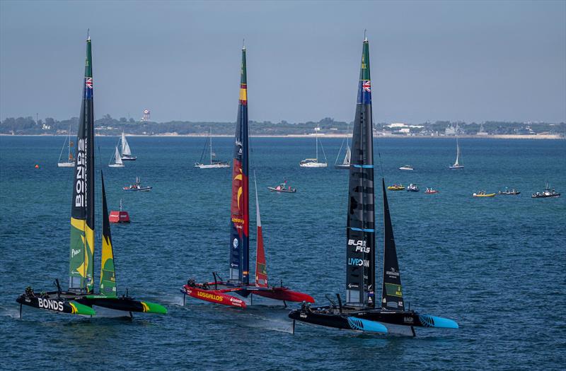 New Zealand SailGP Team helmed by Peter Burling leads Spain SailGP Team helmed by Diego Botin and BONDS Flying Roos SailGP Team helmed by Tom Slingsby in action on Race Day 2 of the DP World Spain Sail Grand Prix held in Cadiz, Spain Sunday 5 October photo copyright Jason Ludlow for SailGP taken at  and featuring the F50 class