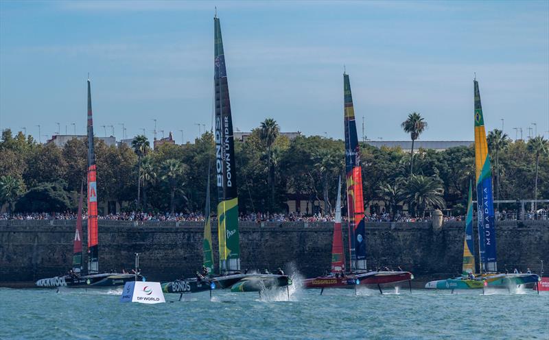 ROCKWOOL Denmark SailGP Team, Spain SailGP Team, BONDS Flying Roos SailGP Team and Mubadala Brazil SailGP Team as they race past the seawall lined with spectators on Race Day 2 of the DP World Spain Sail Grand Prix held in Cadiz, Spain Sunday 5 October photo copyright Felix Diemer for SailGP taken at  and featuring the F50 class